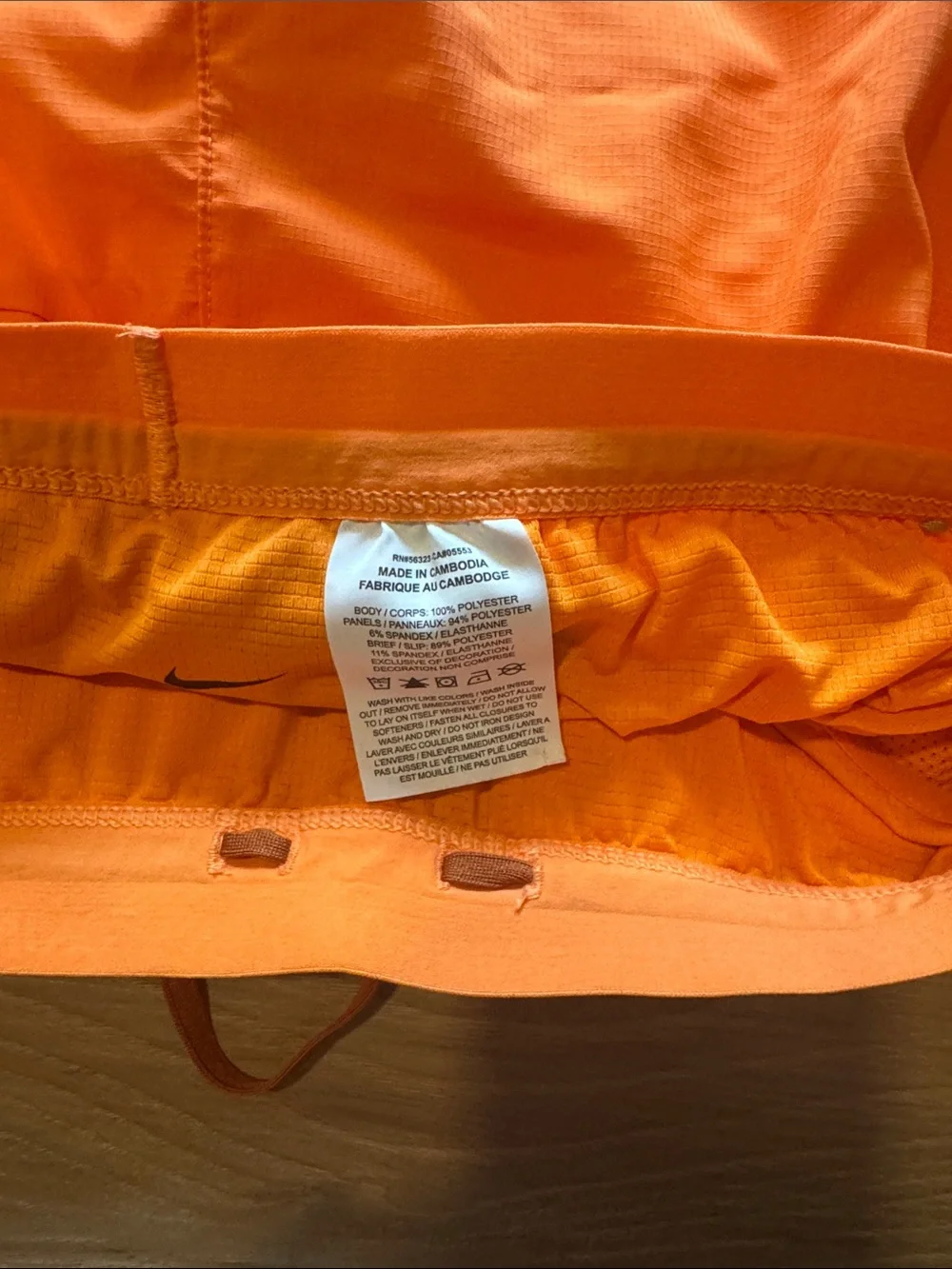 Nike Orange Athletic Running Shorts with Reflective Swoosh
